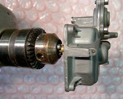 accelerator pump nozzle removal